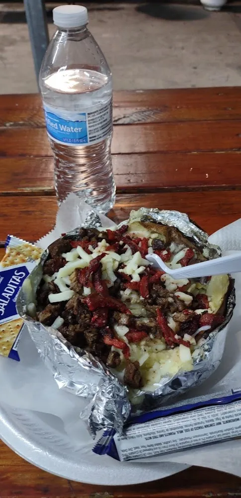 Papa De Trompo Cerdo Con Mantequilla Y Queso Baked Potato with Pork Butter and White Shredded Cheese